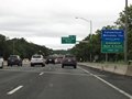 Connecticut welcome sign on Interstate 95 North. Also, take any of the first 4 exits in Connecticut to Greenwich. (Photo taken 8/5/17).