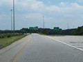Gore point signage for Exit 14B as Interstate 185 South is briefly reduced to a single lane approaching Exit 14A. (Photo taken 5/27/17).